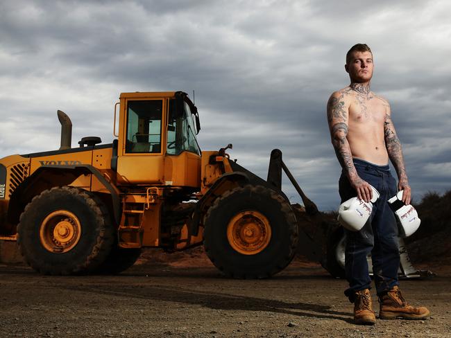 Lewis at the quarry where he works in Spring Farm. Photo: Brett Costello.