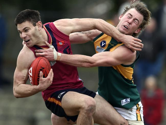 VAFA Footy: Old Scotch v Old Trinity at Camberwell Oval. Evgeni Routman and Ed Weatherson.