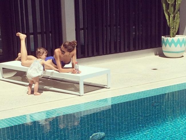 Chilling out...Rebecca Judd relaxes poolside in her new home. Picture: Instagram