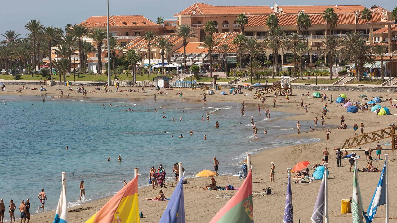 Tourists enjoy a day at Las Vistas beach on the Canary Island of Tenerife in quieter times amid the Covid-19 pandemic. Picture: DESIREE MARTIN / AFP.