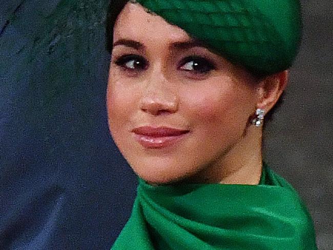 Britain's Prince Harry, Duke of Sussex (L) and Britain's Meghan, Duchess of Sussex (R) take their seats inside Westminster Abbey as they attend the annual Commonwealth Service in London on March 9, 2020. - Britain's Queen Elizabeth II has been the Head of the Commonwealth throughout her reign. Organised by the Royal Commonwealth Society, the Service is the largest annual inter-faith gathering in the United Kingdom. (Photo by Phil HARRIS / POOL / AFP)