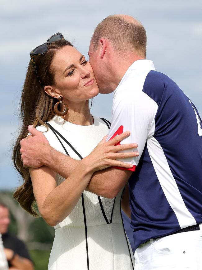 Prince William and Kate embrace each other after the Royal Charity Polo Cup. Picture: Getty Images