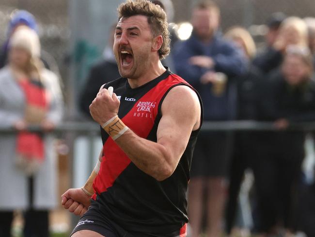 RDFL grand final: Riddell v Diggers Rest: Dylan Tarczon of Riddell (R) celebrates a goal on Sunday September 11th, 2022, in Romsey, Victoria, Australia.Photo: Hamish Blair