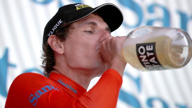 Daryl Impey from Mitchelton-Scott celebrates the overall winner of the 2019 Tour Down Under. (AAP Image/Kelly Barnes)