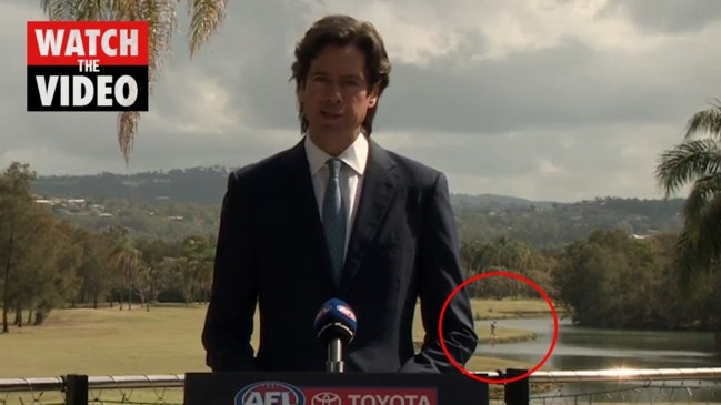 Persistent golfer behind Gil McLachlan steals show at AFL announcement