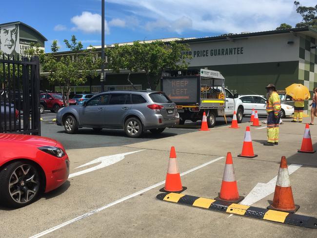 Traffic controllers have had their hands full all week in the Dan Murphy's carpark at Coffs Harbour.