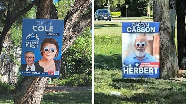 Googley eyes have been added to election signs in Townsville.