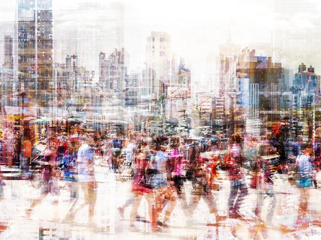 Crowd of anonymous people walking on busy city street - abstract city life concept