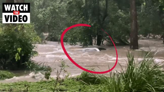 Lucky escape for driver after his Commodore became submerged at Caboolture bridge