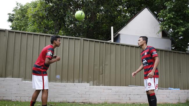 Keanu Baccus and Kearyn Baccus practice their skills in the backyard of their family home in Kings Park.