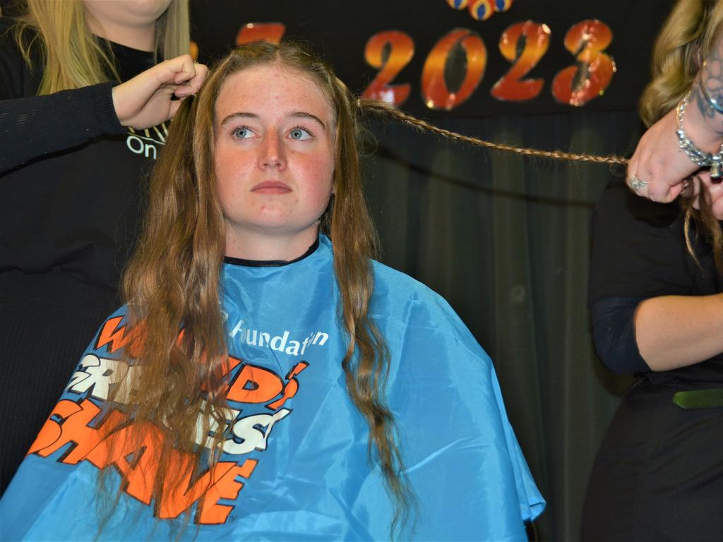 At the St Joseph's College 2023 World's Greatest Shave event is Jordan Steinhardt surrounded by her support crew. Picture: Rhylea Millar