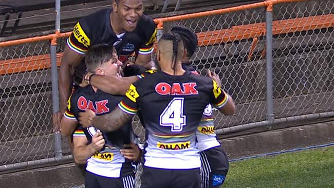 Panthers players celebrate a try.