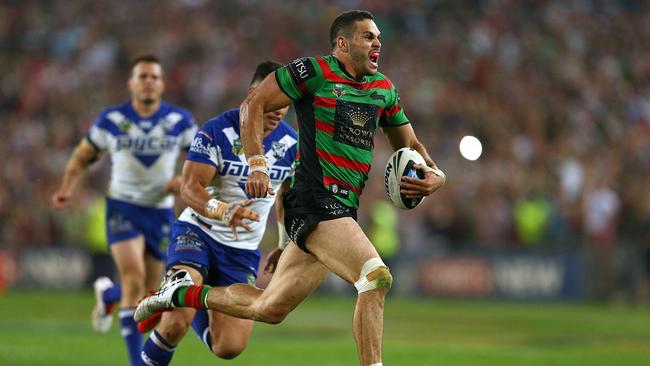 SYDNEY, AUSTRALIA - OCTOBER 05: Greg Inglis of Souths scores a try during the 2014 NRL Grand Final match between the South Sydney Rabbitohs and the Canterbury Bulldogs at ANZ Stadium on October 5, 2014 in Sydney, Australia. (Photo by Renee McKay/Getty Images)