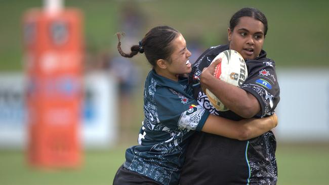 Indigenous All Stars player Bianca Stokes caught in a tackle in the 2023 Deadly Cup Carnival women’s match. Picture: Pema Tamang Pakhrin