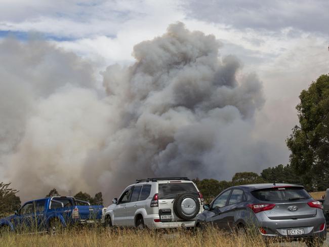 Massive smoke plumes rise from the fire near Queanbeyan. Picture: Sean Davey
