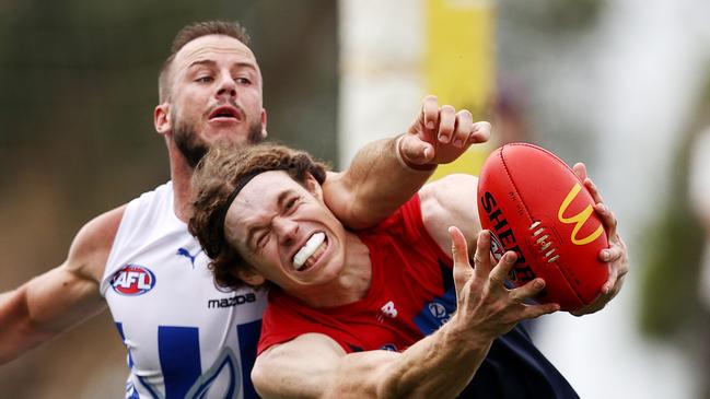 Kangaroos defender Josh Walker attempts to spoil Melbourne forward ben Brown in a practice match at Casey Fields in February 2022. Picture: Michael Klein