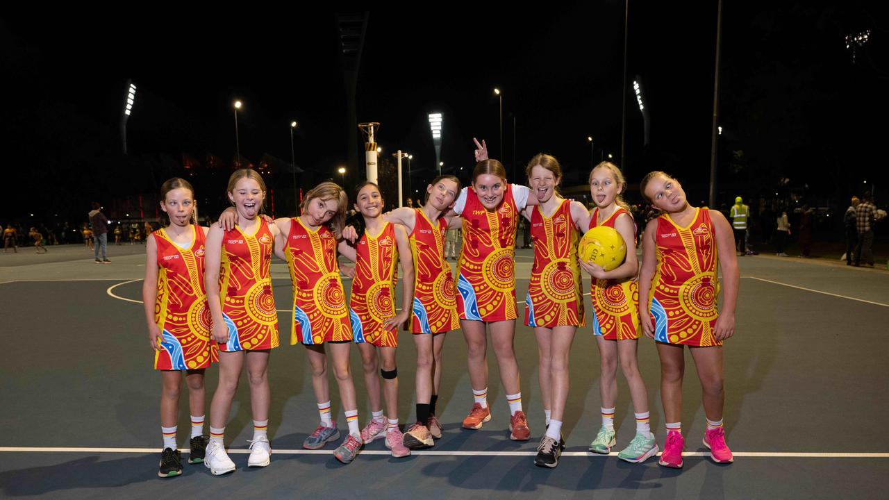 Surf Coast Suns Winkipop under-11 netball team pull their funniest faces.