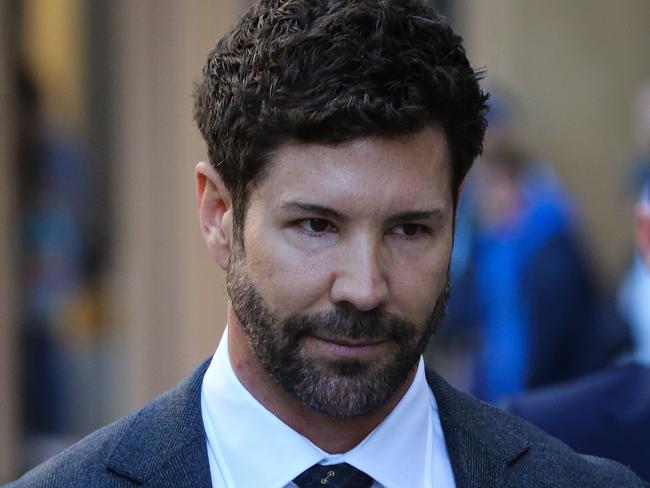 SYDNEY, AUSTRALIA - Newswire Photos - JULY 31 2023:   Former Commando Heston Russell is seen arriving at the Federal Court in Sydney with his legal team. Russell is suing the ABC for defamation. Picture: NCA Newswire /Gaye Gerard