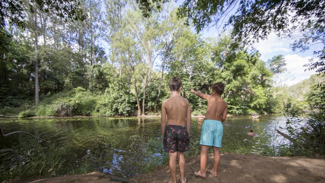 Campers enjoy a waterhole at Neurum Creek Bush Retreat. Photo: Dominika Lis.