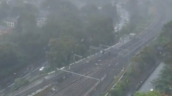 Lightning and heavy rain have caused chaos on the train system.