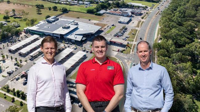 Geon's Ben Griffin and Mark Hunt have welcomed Coles' Todd Riches to the site of the Riverway Plaza expansion in Rasmussen, where a new Coles Supermarket will be a centrepiece. Pictures: Roslyn Budd.