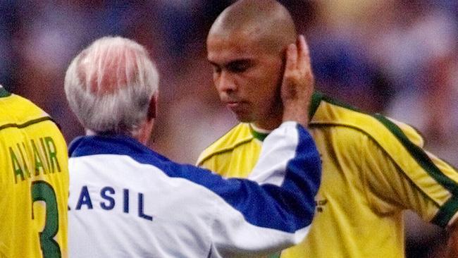 Ronaldo with coach Mario Zagallo after the final. (AP Photo/Ricardo Mazalan)