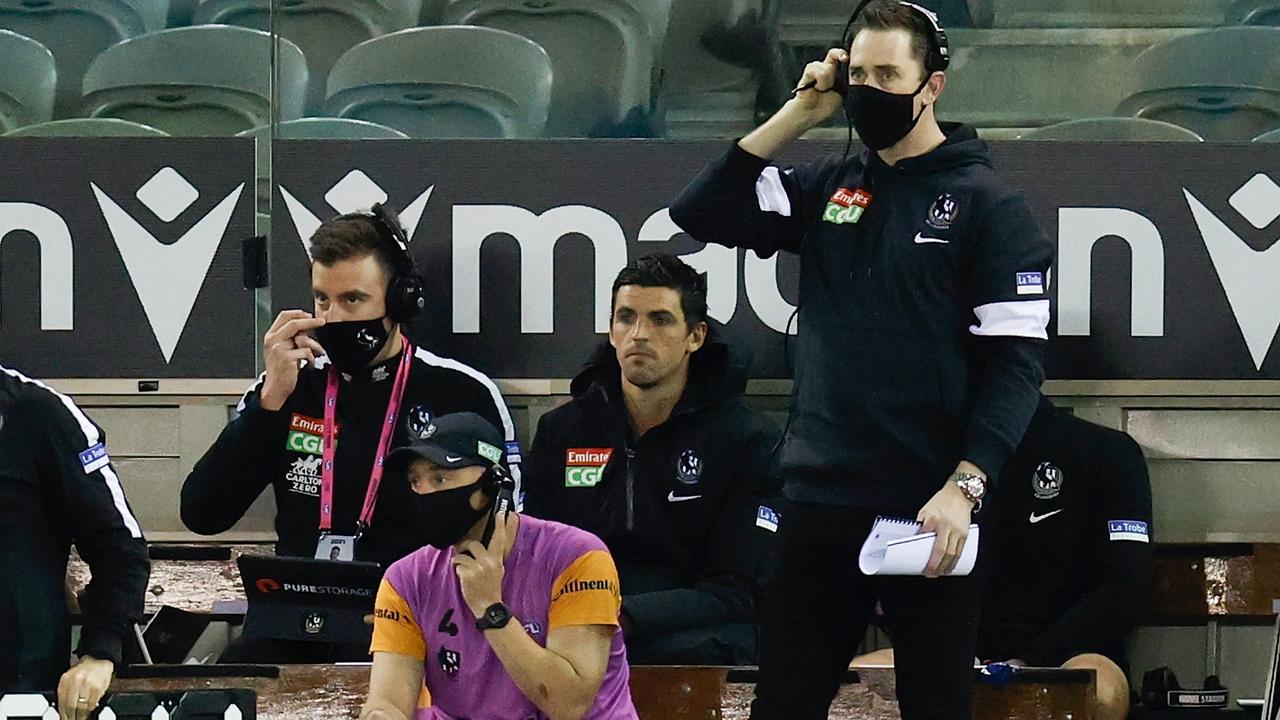 Pendlebury watches on after being subbed out. Picture: Michael Willson/AFL Photos via Getty Images