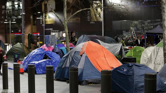 Rows of tents line Martin Place last night. Picture: Christian Gilles