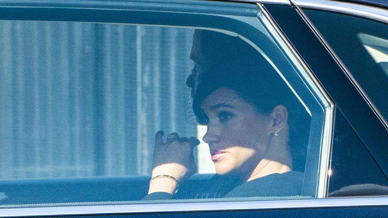 … Meghan in another. Picture: Arthur Edwards – WPA Pool/Getty Images