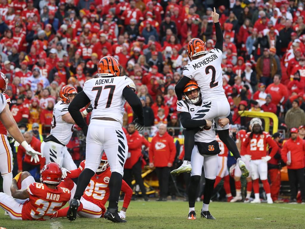 Cincinnati Bengals punter Kevin Huber lifts kicker Evan McPherson into air after making a game-winning field goal in overtime of the AFC Championship game against the Kansas City Chiefs. Picture: Scott Winters/Icon Sportswire via Getty Images