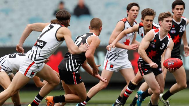 Taj Schofield fires out a handpass during the under-17 futures match on AFL Grand Final day last year. Picture: Darrian Traynor/AFL Photos