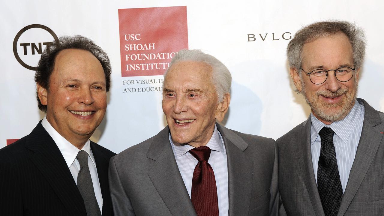 Douglas, centre, with film director Steven Spielberg, right, and actor Billy Crystal at an event honoring Douglas at the California Science Center in Los Angeles, 2008. Picture: AP