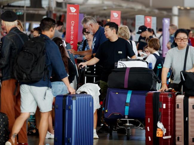 SYDNEY, AUSTRALIA - NewsWire Photos MARCH 28, 2024: Travellers get a headstart on their Easter holiday travel at Sydney Airport on Thursday morning. Picture: NCA NewsWire / Nikki Short