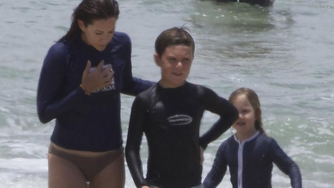 Princess Mary and Prince Frederik swimming at a beach on the Gold Coast with their children. Prince Christian was rescued from a dangerous rip by lifesavers. Photo: INFphoto.com