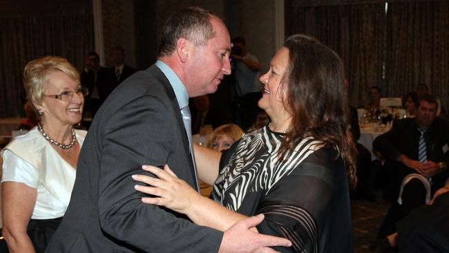 Mutual respect: Barnaby Joyce and Gina Rinehart embrace during the launch of a book by the latter in 2012.