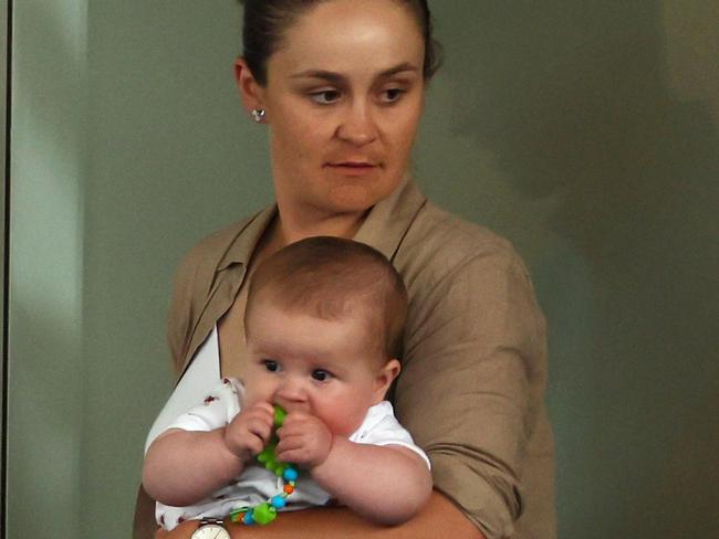 FEE APPLIES - Retired tennis champion Ash Barty was seen at the Brisbane International, enjoying watching tennis and signing autographs for fans. Her mother Josie was the perfect grandmother looking after Ash's newborn boy Hayden.