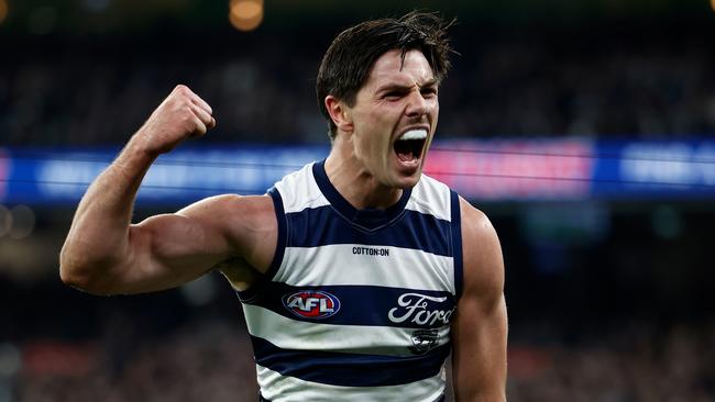 MELBOURNE, AUSTRALIA - JULY 12: Oliver Henry of the Cats celebrates a goal during the 2024 AFL Round 18 match between the Collingwood Magpies and the Geelong Cats at Melbourne Cricket Ground on July 12, 2024 in Melbourne, Australia. (Photo by Michael Willson/AFL Photos via Getty Images)