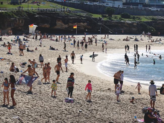 Some residents dipped their toes into the water. Picture: NCA NewsWire / Nicholas Eagar.