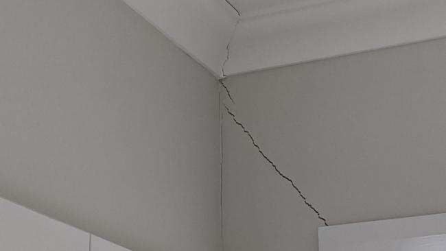 Cracks in the walls of a house near Armoury Rd, Jordan Springs East. Lendlease says the house is repairable, and the cracks shouldn't reappear.