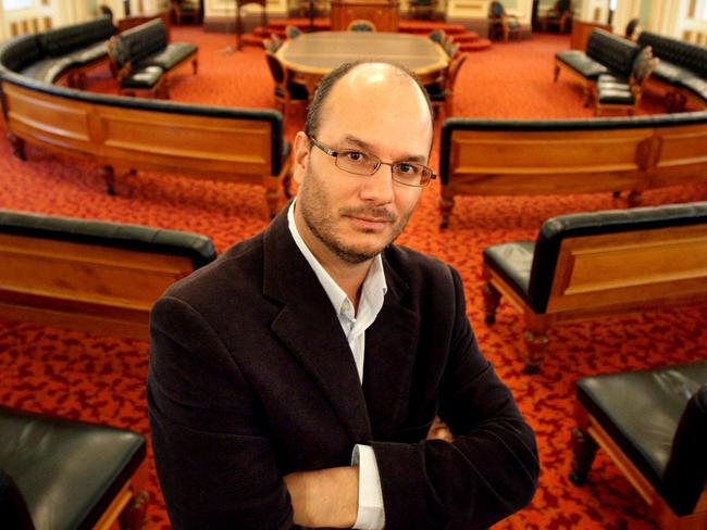 Nicholas Aroney, The University of Queensland reader in law, stands in the chamber that once housed the Queensland Upper house at Parliament House, Brisbane.