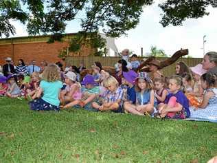 Children in a choir sat in the camphor laurel's shade to prepare for the opening of the Alstonville Community preschool's new Crawford Park site in 2016. Picture: Leah White