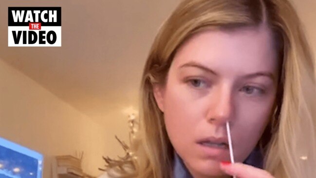 Woman compares COVID test results from nose and throat swab