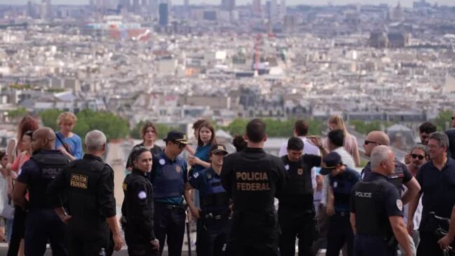 Tourists welcome foreign police ahead of Paris 2024