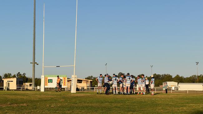Spectators cheer on as they watch the A Grade Roma vs Condamine match at the Roma Rugby Races at Bassett Park. Picture: Chloe Cufflin.