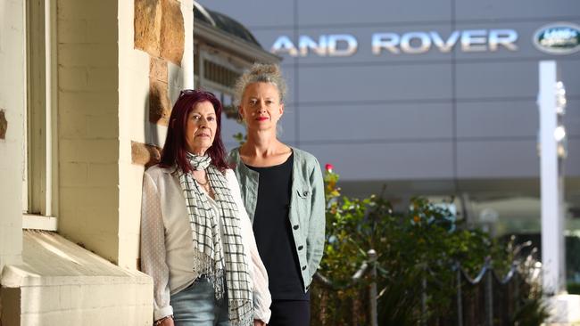 Jen Byrne and Joanna Wells oppose the proposed demolition of a villa on Belair Rd to make way for a car showroom. Picture: Tait Schmaal