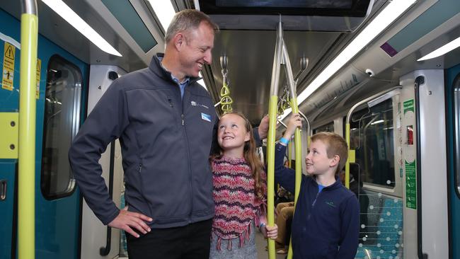 Secretary of Transport NSW Rodd Staples with children Anna, 11, and Jack, 9. Picture: David Swift