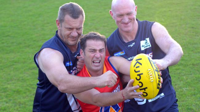 Seemed like a good idea at the time - Damien Monkhorst, Karl Stefanovic and Mick Martin before this year’s EJ Whitten Legends Game.