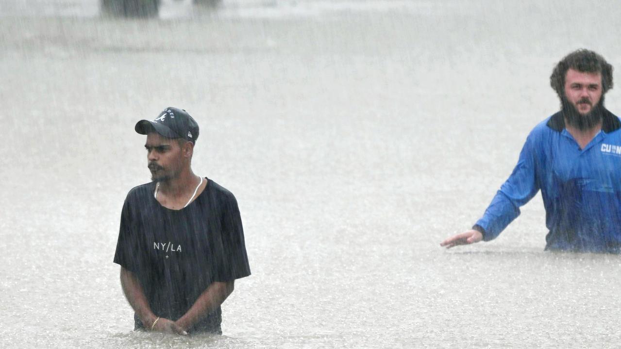 Flooding in the streets of Ingham. Photo: Mostyn Swain