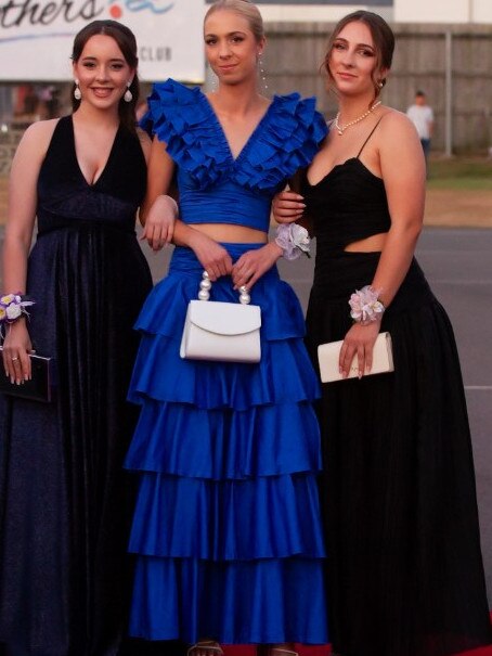 Natasha Milliken, Elise Duxbury and Erica Milliken at the 2023 Bundaberg State High School Formal.