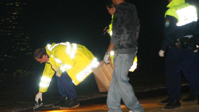 Police recover the weapon from the beach where Oldham shot himself.